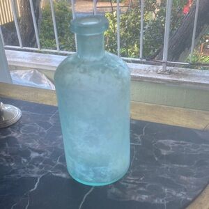 Vintage iridescent Blue Glass Bottle